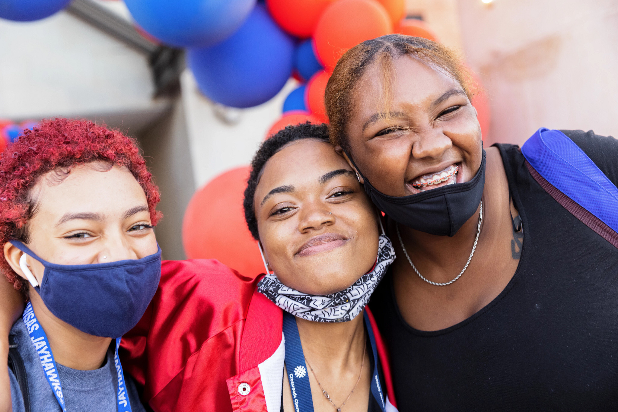 Three students enjoying festivities at Hawk Week Unionfest.